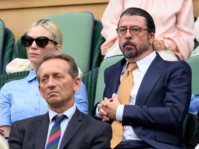 LONDON, ENGLAND - JULY 02: Dave Grohl and Jordyn Blum attend day two of the Wimbledon Tennis Championships at the All England Lawn Tennis and Croquet Club on July 02, 2024 in London, England. (Photo by Karwai Tang/WireImage)