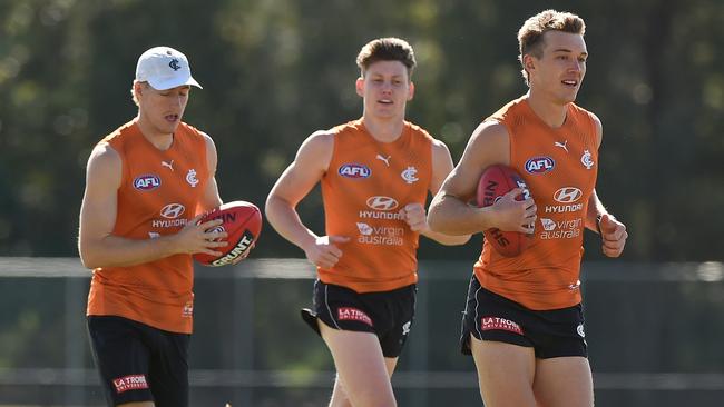 Patrick Cripps, right, will be a KFC SuperCoach bargain after the Blues’ Round 10 bye. Picture: Matt Roberts/Getty Images