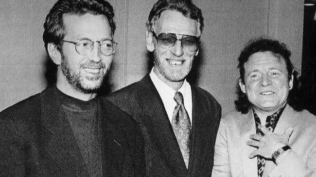12/01/1993 Members of former rock group Cream, together prior to their induction into the Rock and Roll Hall of Fame in Los Angeles. (L-R) Eric Clapton, Ginger Baker & Jack Bruce.