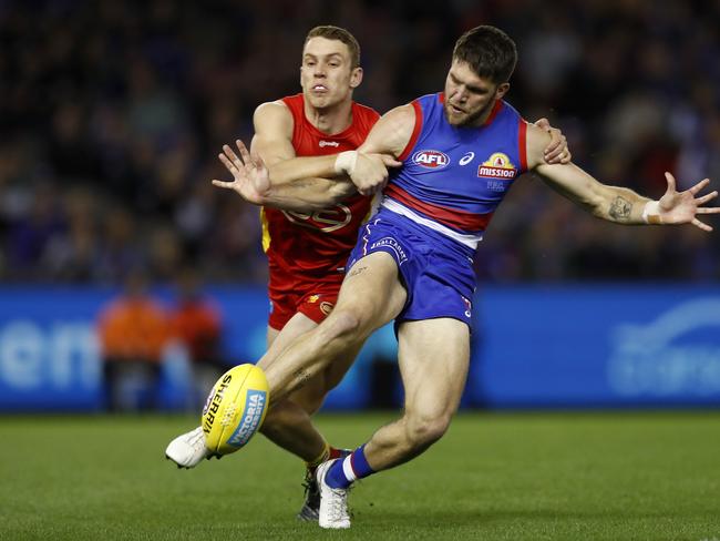 MELBOURNE, AUSTRALIA - APRIL 17: Bailey Williams of the Bulldogs kicks the ball during the round five AFL match between the Western Bulldogs and the Gold Coast Suns at Marvel Stadium on April 17, 2021 in Melbourne, Australia. (Photo by Darrian Traynor/AFL Photos/via Getty Images)