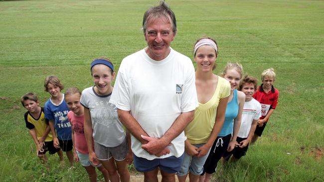 JANUARY 29,  2006:   News Reporter:Jeremy Pierce :Pics a Murwillumbah Sports Ground of Hugh Small who will be running the Commonwaelth Games Baton. Hugh getting some practice in with the kids he trains with a bottle of water as a baton PicAnn-Louise/Hovey   sport L-R Aaron Booth 9, Keelan Biltoft 11, Bronte Anthony 11, Ashley Biltoft 13, Hugh Small, Molly Baxter 14, Rachel Whitford 13, Lincoln Booth 11 and Elliot Butler 11.