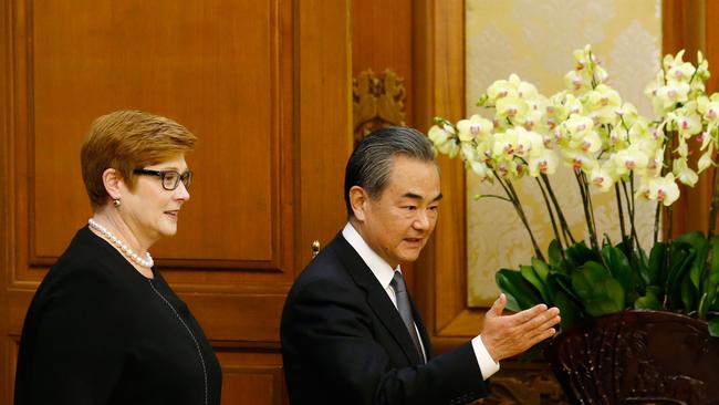 Australia's Foreign Minister Marise Payne and Wang Yi arrive for a news conference this week in Beijing.