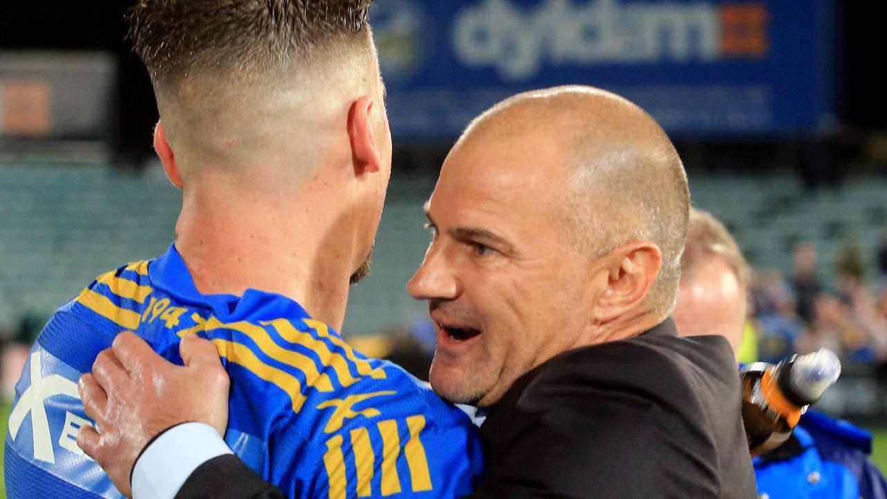 Eels Coach Brad Arthur hugs Clint Gutherson. Photo: Mark Evans.