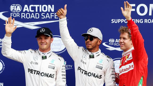 Top three qualifiers, Lewis Hamilton of Great Britain and Mercedes GP, Nico Raosberg of Germany and Mercedes and Sebastian Vettel of Germany and Ferrari.