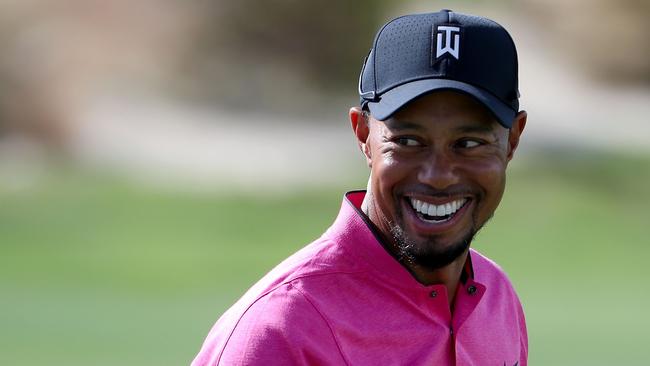 Tiger Woods practices chipping ahead of the Hero World Challenge.