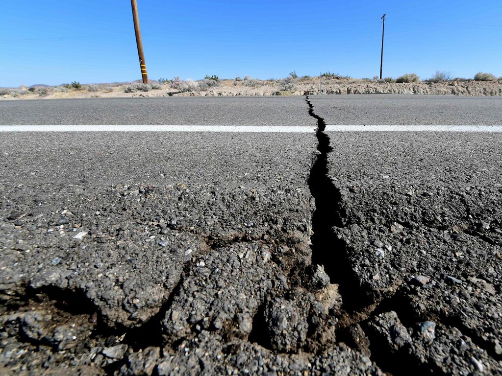 Cracks are seen on the road along Hwy 178 north of Rodgecrest south of Trona. Picture: AFP