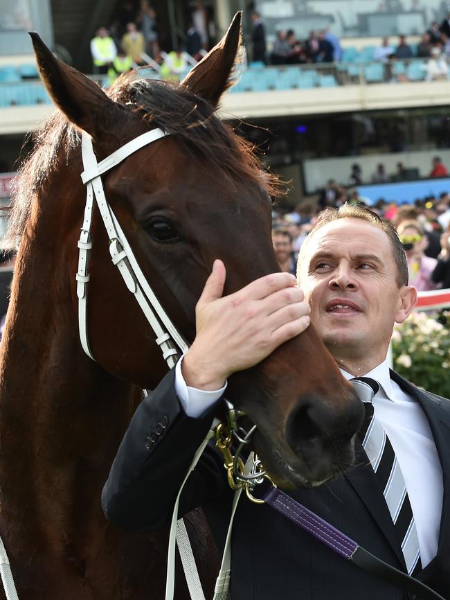 Trainer Chris Waller embraces his mighty mare Winx.