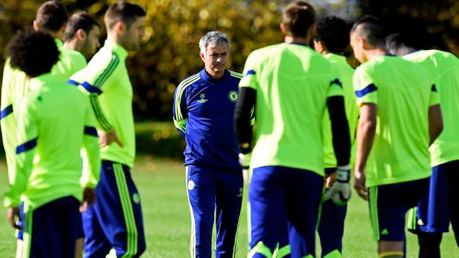 Chelsea manager Jose Mourinho watches over his Chelsea players in 2014.