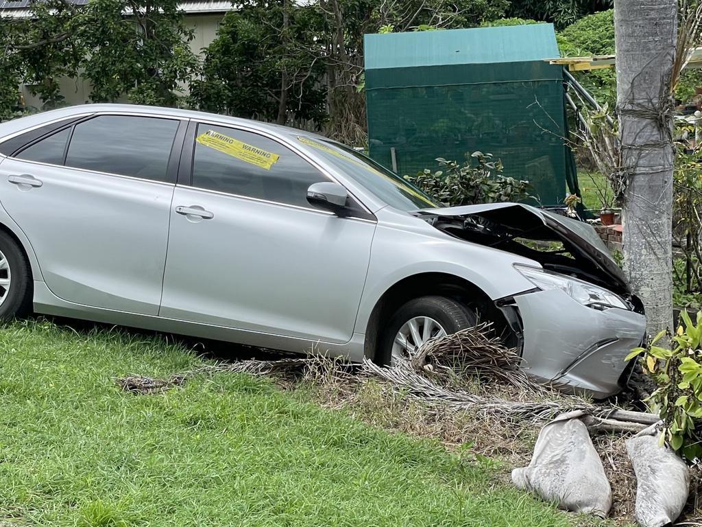 After suffering a medical episode, an elderly male driver crashed into a tree close to Glenella State School. Photo: Fergus Gregg