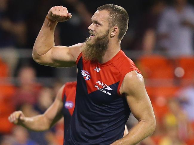 GOLD COAST, AUSTRALIA - MAY 07: Max Gawn of the Demons celebrates a goal during the round seven AFL match between the Gold Coast Suns and the Melbourne Demons at Metricon Stadium on May 7, 2016 in Gold Coast, Australia. (Photo by Chris Hyde/Getty Images)
