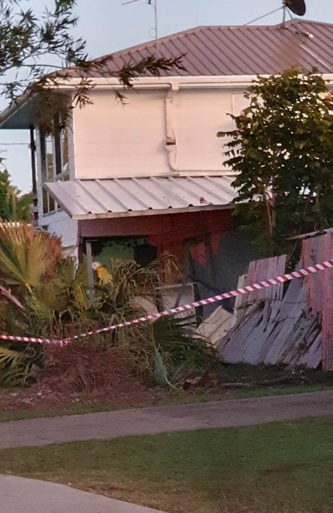 A crime scene was declared at the Urangan home which was damaged after a car smashed into it and the driver fled.