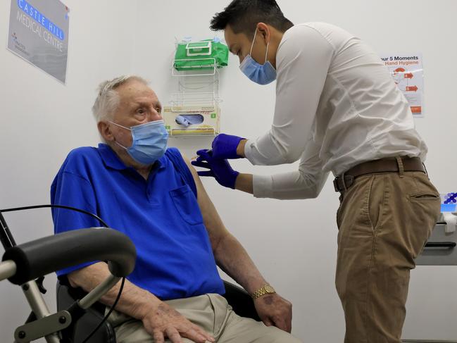 Aged-care resident John Healy gets his a COVID-19 vaccination from Doctor Jesse Li. Picture: Mark Evans/Getty Images