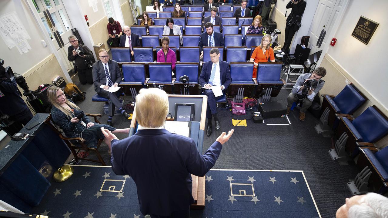 Mr Trump during today’s briefing. Note the social distancing in the room. Picture: Alex Brandon/AP