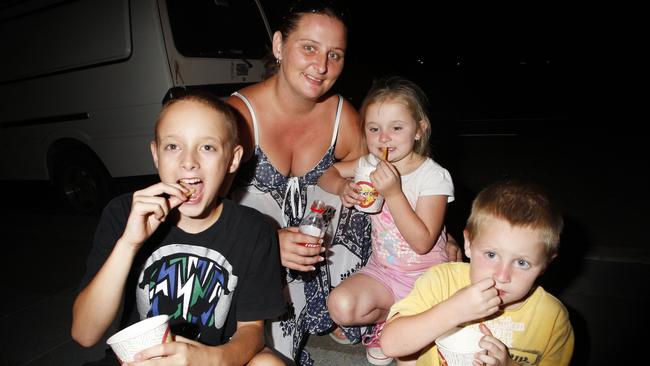 Tanya McPhail of Redbank Plains with her children from left, Jamie, 11, Breana, 4, and Warren, 4, at 2010 New Year’s Eve celebrations held in Timothy Moloney Park, Woodend. Picture: David Nielsen