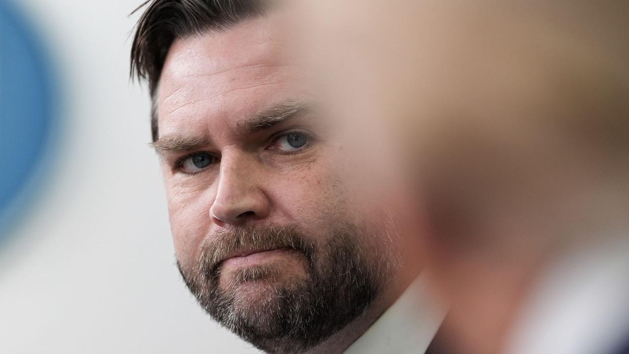 US Vice President JD Vance, standing alongside President Donald Trump (R), speaks about the mid-air crash. (Photo by Oliver Contreras / AFP)