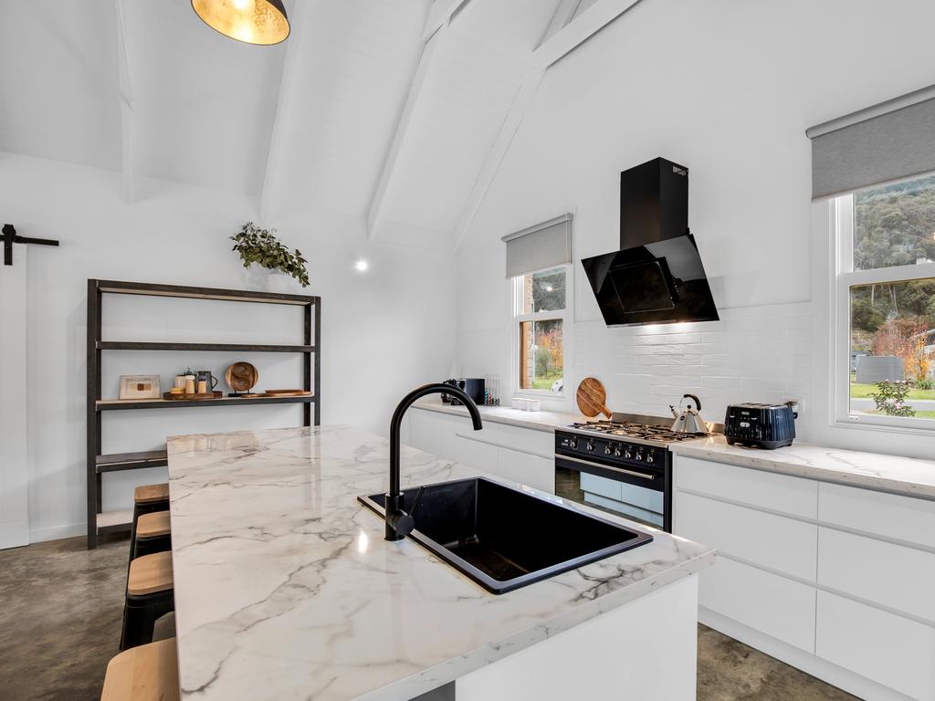 A kitchen perfect for spending time with friends and family. Picture: Stayz