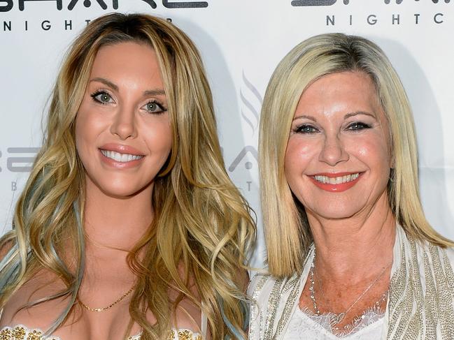 LAS VEGAS, NV - AUGUST 09:  Singer Chloe Lattanzi (L) and her mother, singer/actress Olivia Newton-John celebrate the 35th anniversary of "Xanadu" with the world premiere of their music video "You Have to Believe" at Share Nightclub on August 9, 2015 in Las Vegas, Nevada.  (Photo by Bryan Steffy/WireImage)