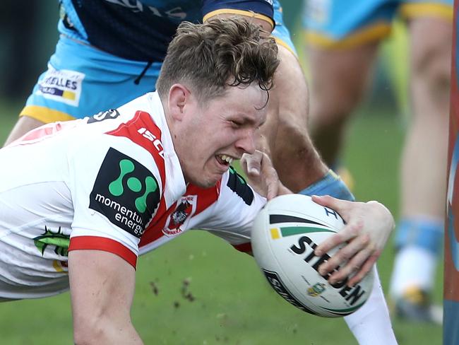 SYDNEY, AUSTRALIA - AUGUST 12:  Kurt Mann of the Dragons scores a try during the round 23 NRL match between the St George Illawarra Dragons and the Gold Coast Titans at UOW Jubilee Oval on August 12, 2017 in Sydney, Australia.  (Photo by Mark Kolbe/Getty Images)