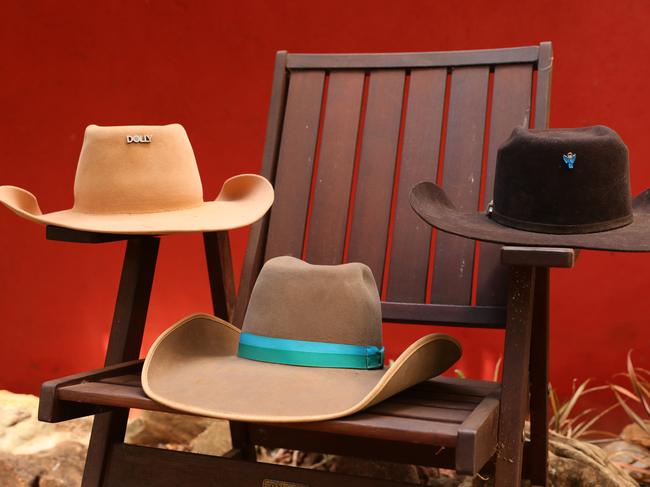 Tick, Kate and Meg’s Akubras all carry a tribute to Dolly. Picture: Lachie Millard