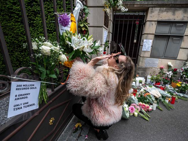 A woman pays her respects outside the estate of late singer Tina Turner. Picture: AFP