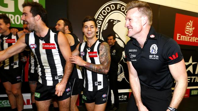 Nathan Buckley shares a laugh with his players after the win. Picture: Wayne Ludbey