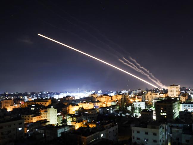 Rockets are launched from Gaza City, controlled by the Palestinian Hamas movement, towards Israel. Picture: Mahmud Hams / AFP