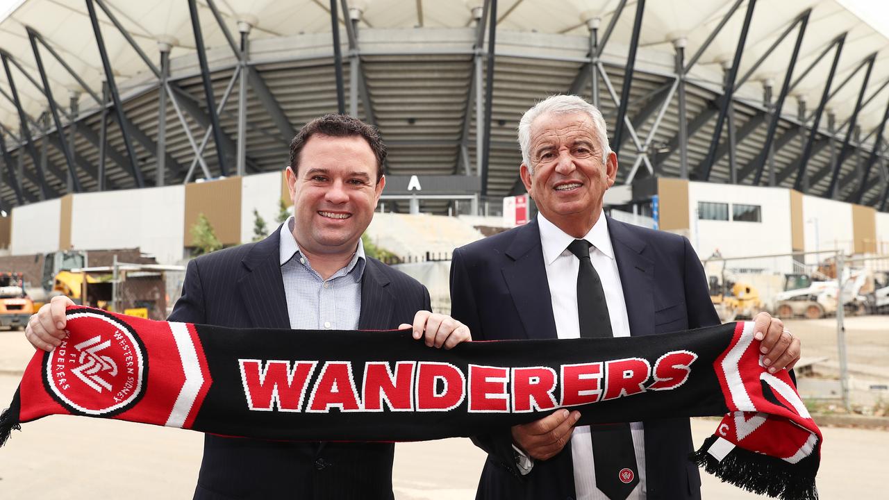 NSW Minister for Sport Stuart Ayres (L) and Western Sydney Wanderers Chairman Paul Lederer (R) pose in front of Bankwest Stadium