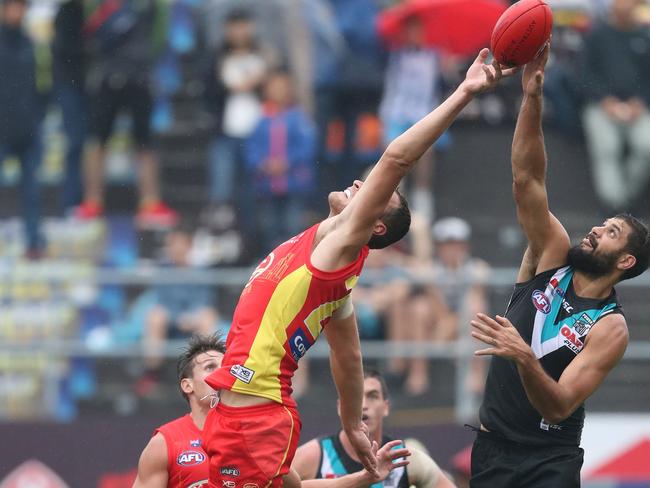 Suns big man Jarrod Witts competes with Port’s Paddy Ryder. Pic: Getty Images