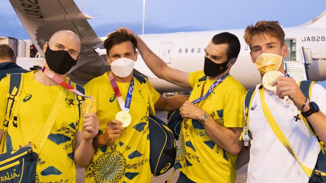 Gold medallist rowers Spencer Turrin, Alexander Hill, Alexander Purnell and Jack Hargreaves return to Australia. Picture: Getty Images