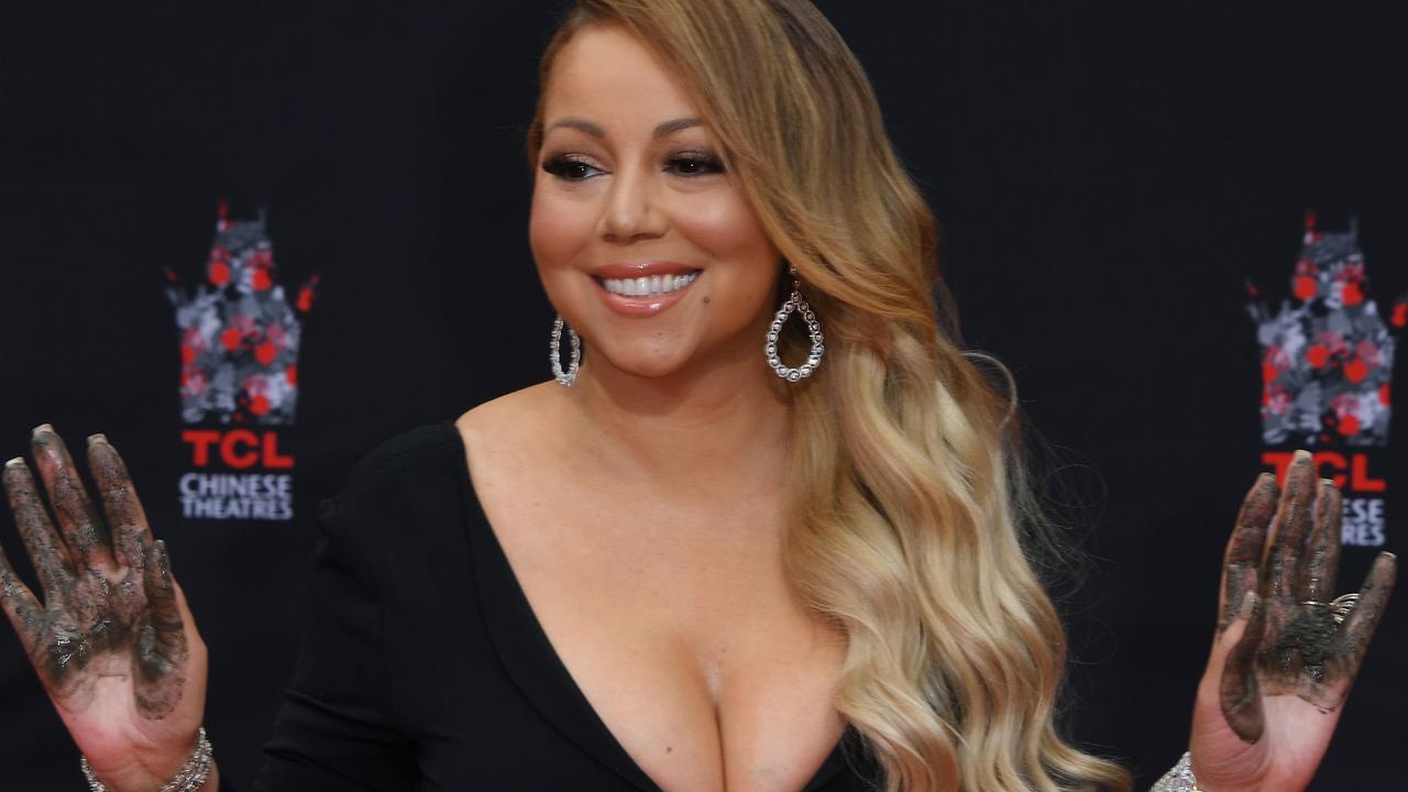 Mariah Carey is honoured with a hand and footprint ceremony at the TCL Chinese Theatre in 2017. Picture: Mark Ralston/AFP