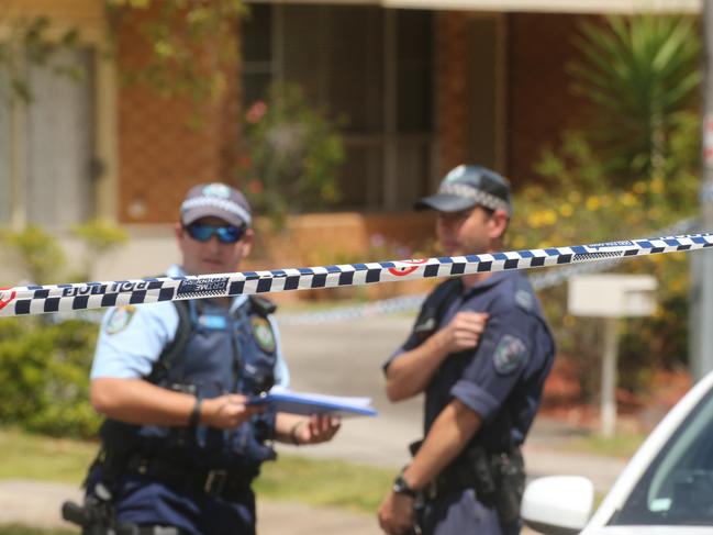 Police outside the Georges Hall home involved in the drive by shooting.