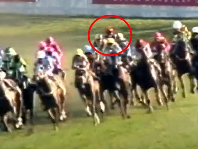 Super Impose (red cap, circled) had a wall of horse in front of him as they turned for home in the 1991 Epsom.