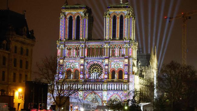 Notre Dame cathedral full of light and colour on Thursday night. Picture: AFP