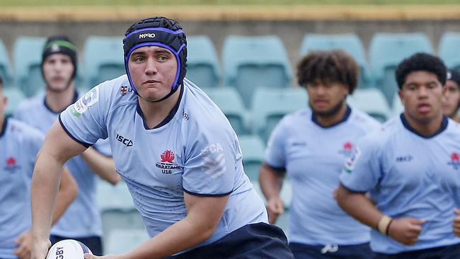 Oliver Smith, playing in the Super Rugby U16s last year, was one of numerous scorers for the Waratahs against the Reds on Saturday. Picture: John Appleyard.