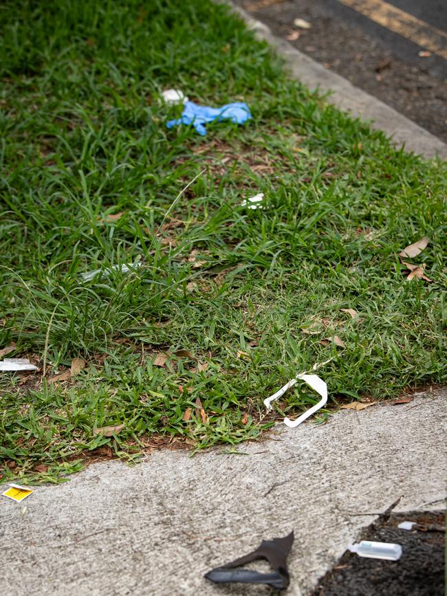 Ambulance paramedics treated the cab driver at the scene before he was taken to hospital. Picture: Julian Andrews