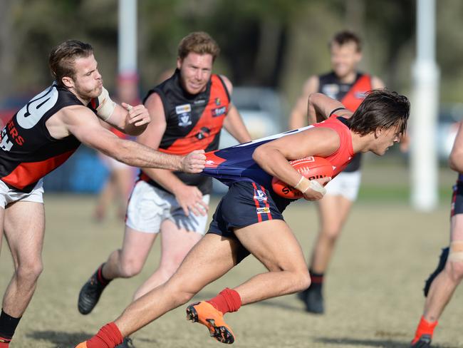 MPNFL Div 1: Mt Eliza v Frankston Bombers at Emil Madsen Reserve. Frankston Bombers #69 Josh Chapman tackles Mt Eliza #47 Thomas Freeman. Picture:AAP/ Chris Eastman