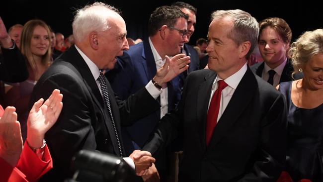 Former Prime Minister Paul Keating congratulates Bill Shorten at the Labor Party campaign launch in Brisbane yesterday.