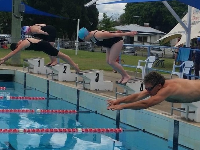 Grafton Services Swim Club member Damien O'Mahony dives in off the blocks in the 45-49 years 50m freestyle championship.