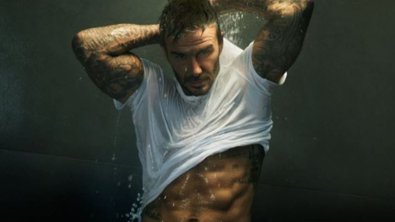 David Beckham strips off in steamy new ad