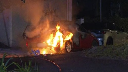 Magney street in Woollahra where a car was set alight and anti-Israel graffiti was sprayed on garage walls. Picture: Channel 7