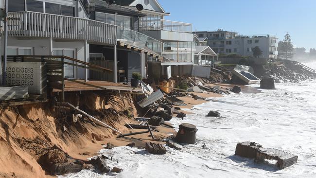 High tide hits damaged beachfront homes along Pittwater Road at Collaroy. Picture: AAP