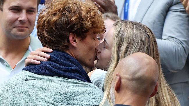 Jannik Sinner of Italy celebrates with his girlfriend Anna Kalinskaya. Photo by Matthew Stockman/Getty Images.