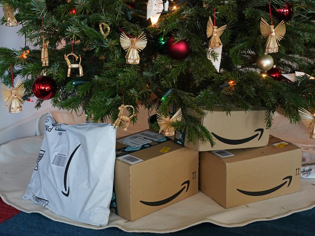 Packages from Amazon under the Christmas tree. A new report has slammed the amount of plastic packaging the company uses. Picture: Getty Images