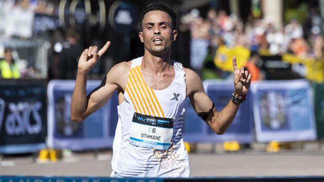 Othmane El Goumri crossing the line to win the Sydney Marathon. Picture: NCA NewsWIRE: Monique Harmer