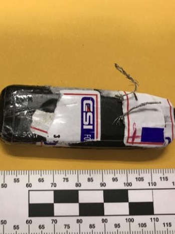 The mobile phone, USB card and SIM card found in a day room attached to Bassam Hamzy’s cell last year. Source: NSW Police