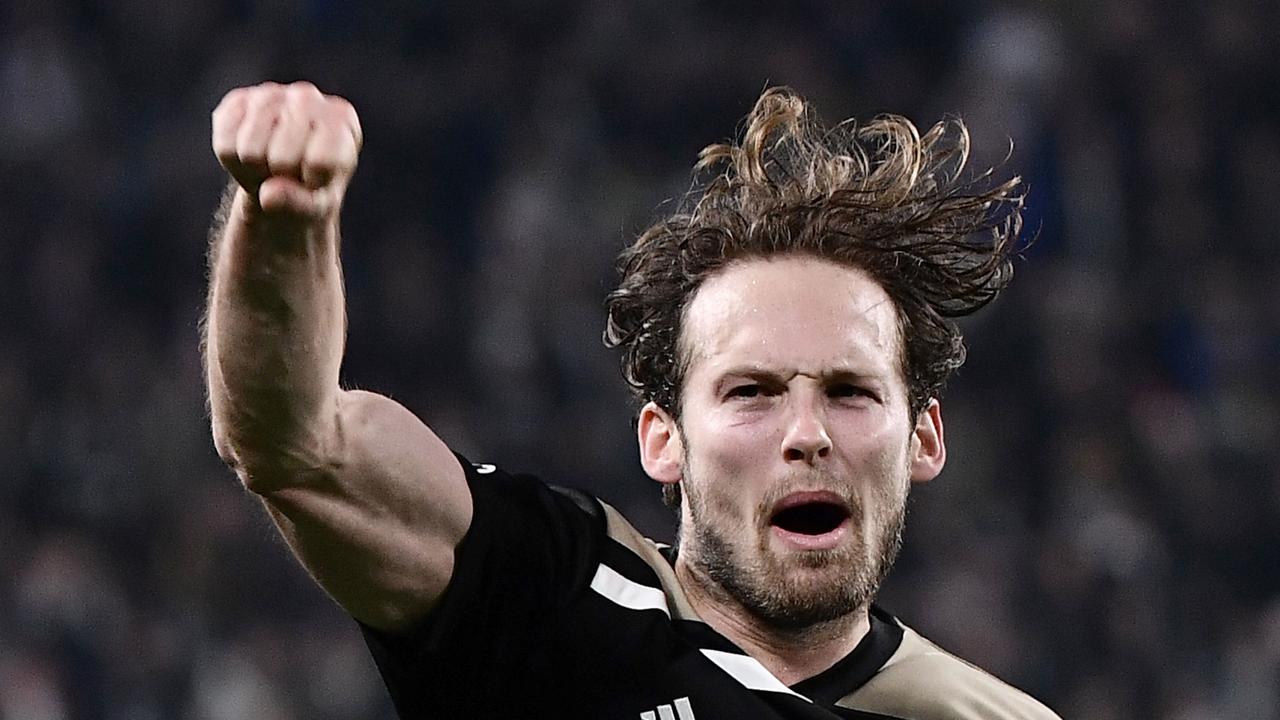 Ajax's Dutch defender Daley Blind celebrates