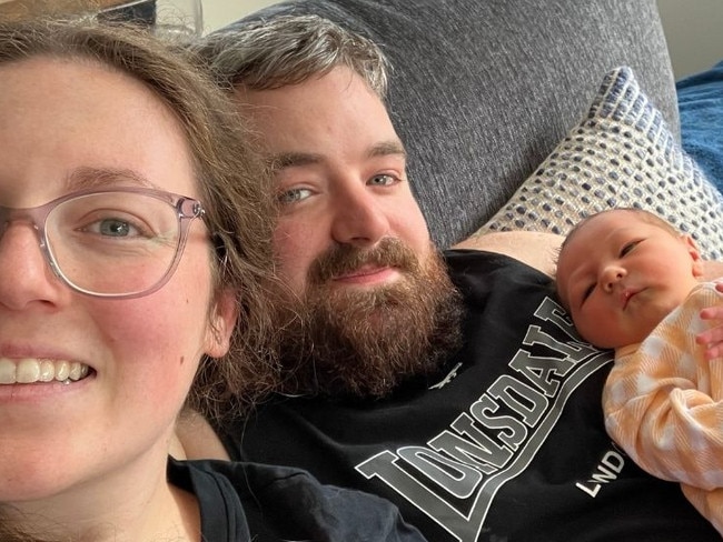 Imogen, Michael and Beau at home enjoying time as a family.