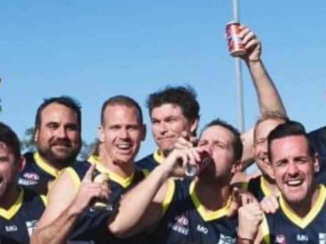 Late Broadbeach Cats 1996 premiership player Adrian Felici (middle of back row holding can in the air). Picture: Supplied.