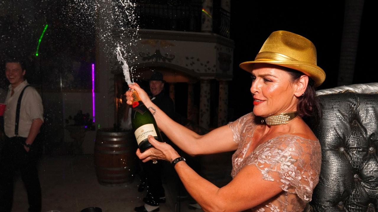 Gold Coast's Belinda Gavin celebrates New Year's Eve at the Candy Shop Mansion in Helensvale at a party hosted by tobacconist franchise tycoon Travers 'Candyman' Beynon