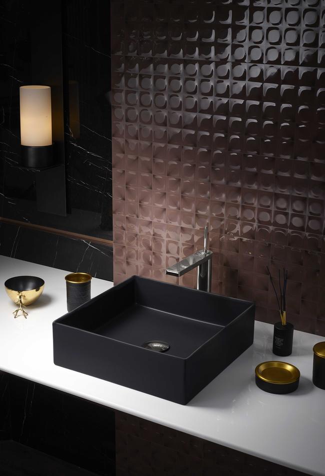 The black-honed Mica countertop vessel bathroom basin is available in both round and square format from Kohler. Team it with brass accessories for a little drama.